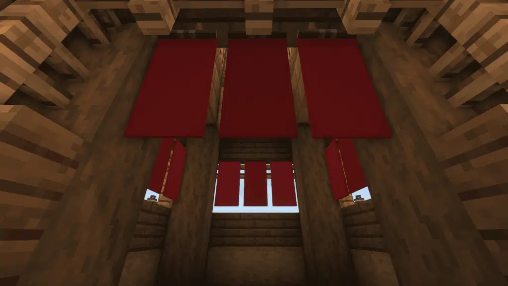 place 3 red banner on each side of the wall in minecraft