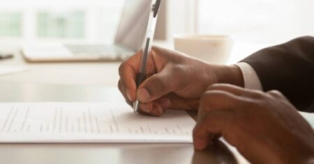 A Contract Being Signed