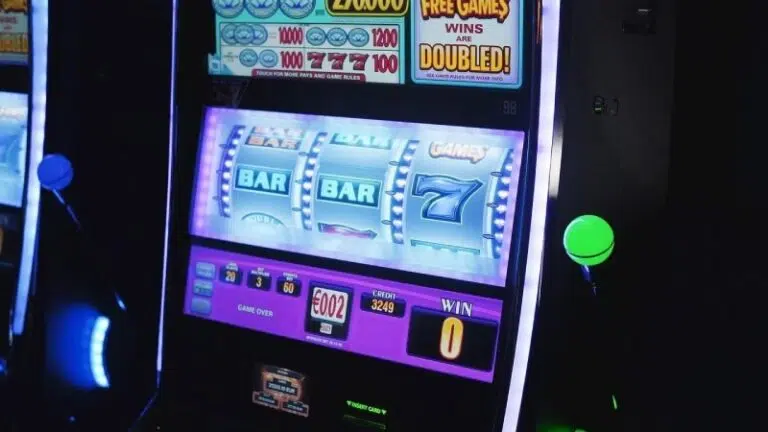 Slot game with lever and traditional reel